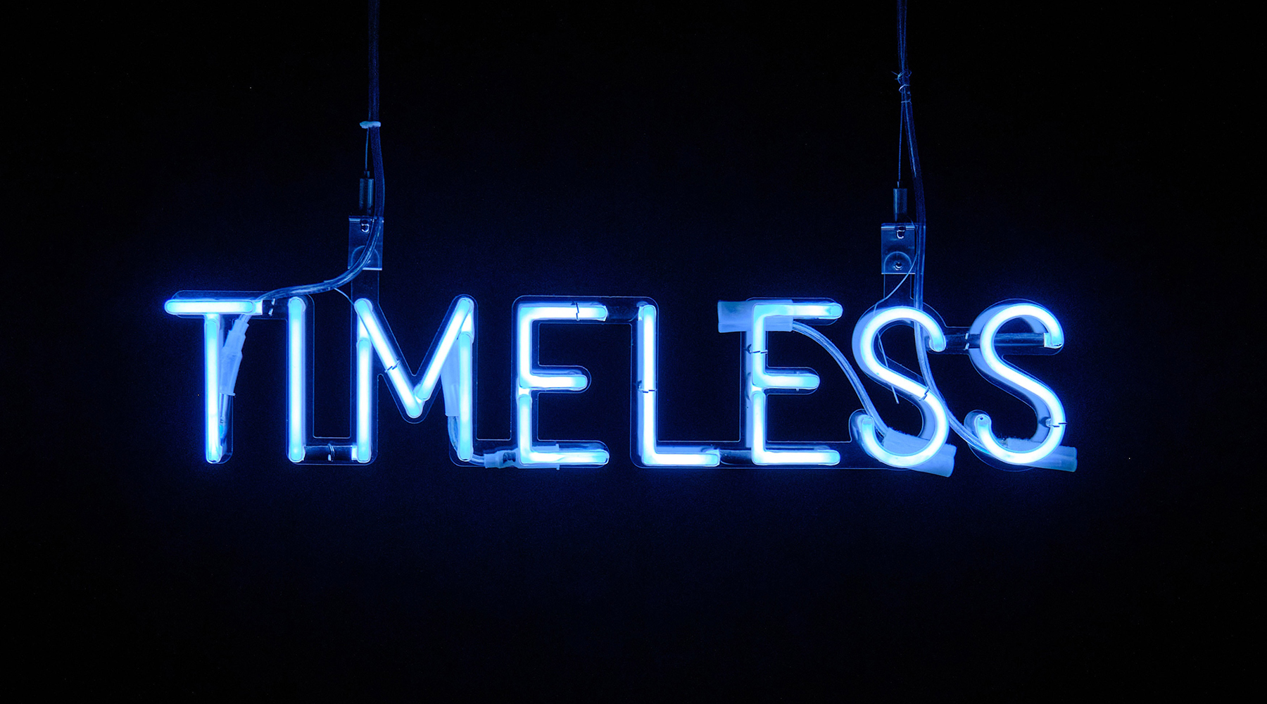 neon sign of the word "timeless"